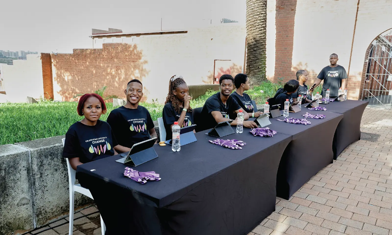 Better Measure staff at an event RSVP and accreditation check-in table